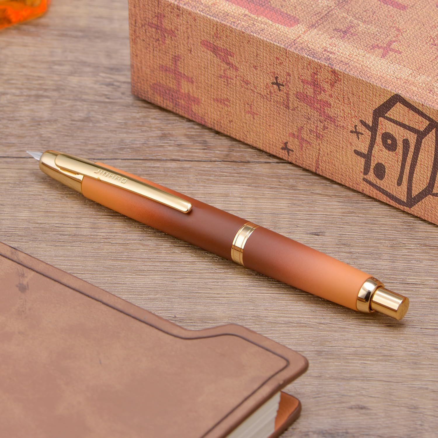 Jinhao 10 Capless Fountain Pen with Box – Marble Red & Caramel Orange, Retractable Fine Iridium Nib, Golden Clip, Ink Converter Set