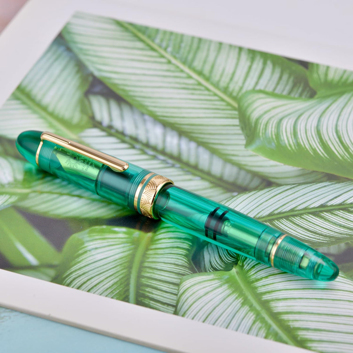 Moonman P140 Demonstrator Special Edition Fountain Pen – Transparent Green Resin, Size 8 Nib, Brass Piston Filling, Gold Trim