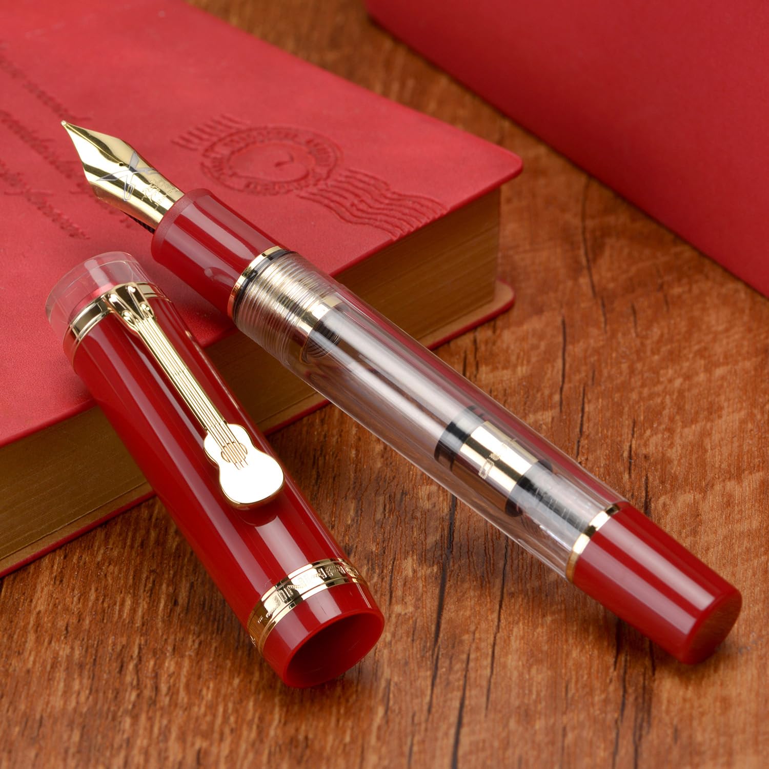 Jinhao 1935 Tiandao Series Fountain Pen – Red & Clear Acrylic Body, Dual tone Medium Nib Nib, Gold Guitar Clip With Large Converter