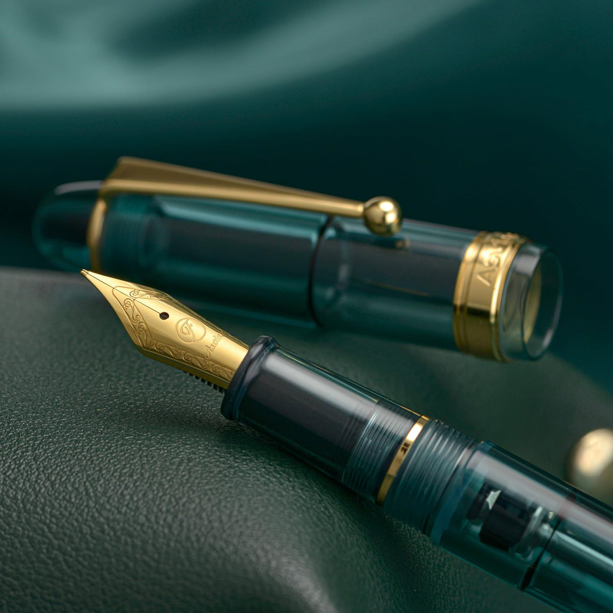 Asvine V126 Teal Blue Vacuum Filling Fountain Pen, Gold Trim Demonstrator
