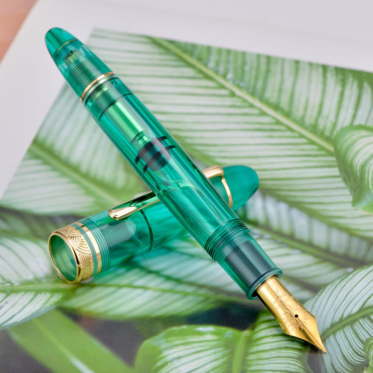 Moonman P140 Demonstrator Special Edition Fountain Pen – Transparent Green Resin, Size 8 Nib, Brass Piston Filling, Gold Trim