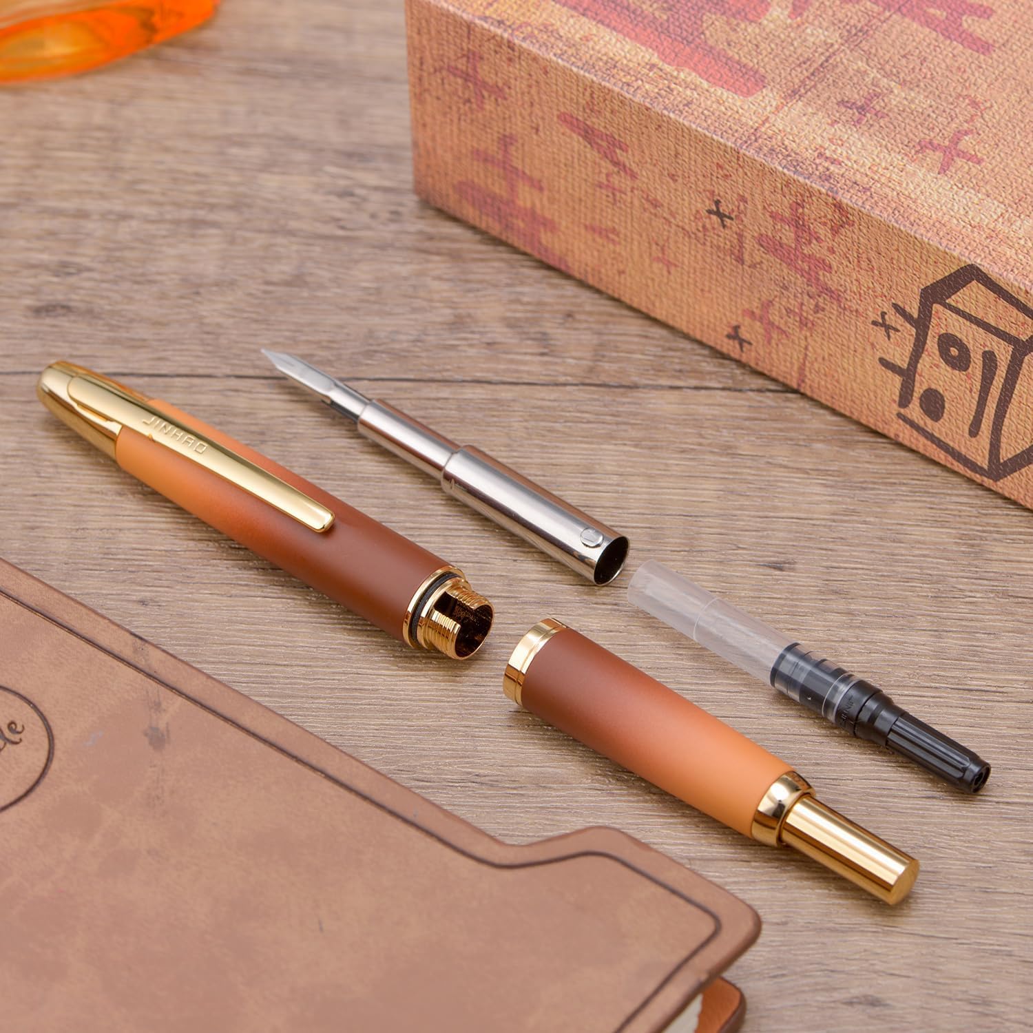 Jinhao 10 Capless Fountain Pen with Box – Marble Red & Caramel Orange, Retractable Fine Iridium Nib, Golden Clip, Ink Converter Set