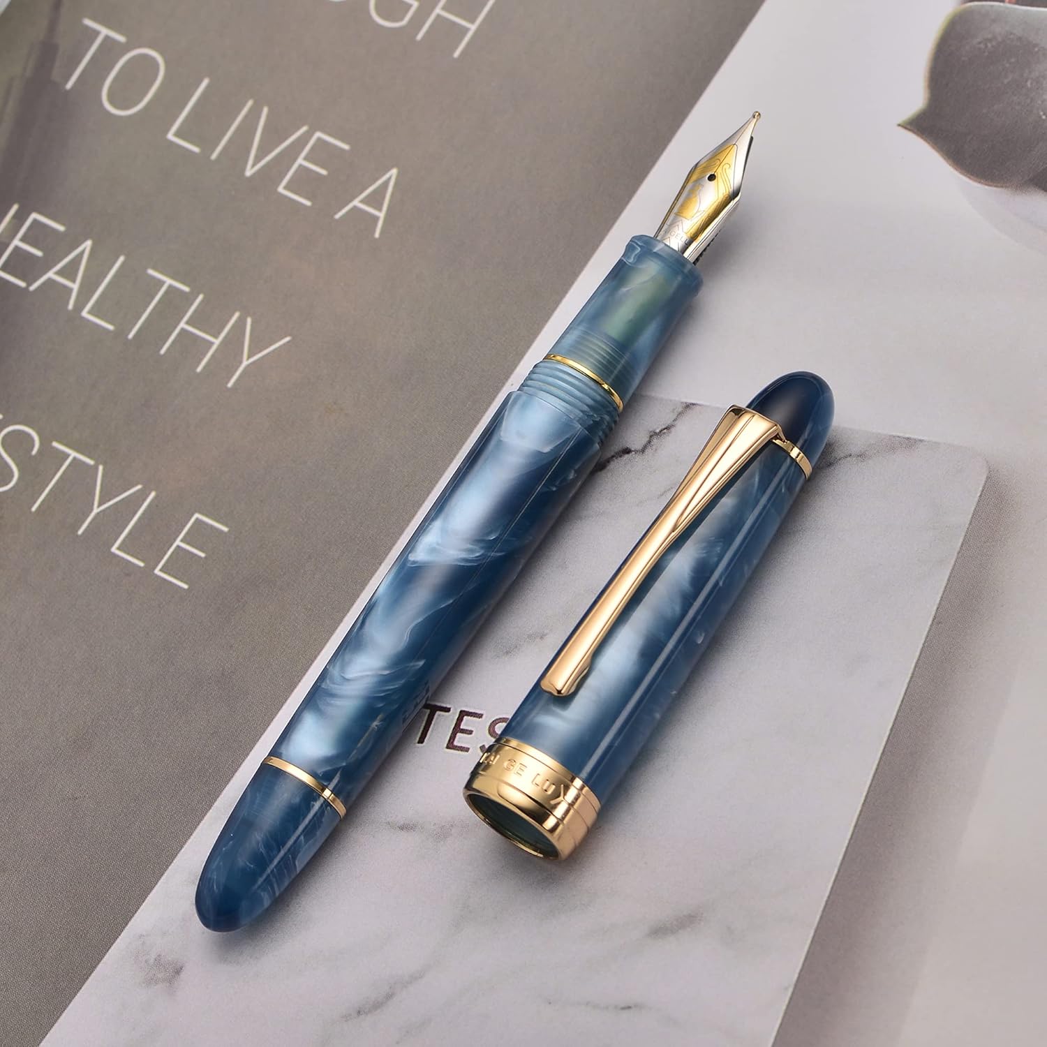 Kaigelu 356 Acrylic Fountain Pen with Iridium Nib, Blue White Marbled Resin Body, Gold Trim & Ink Converter