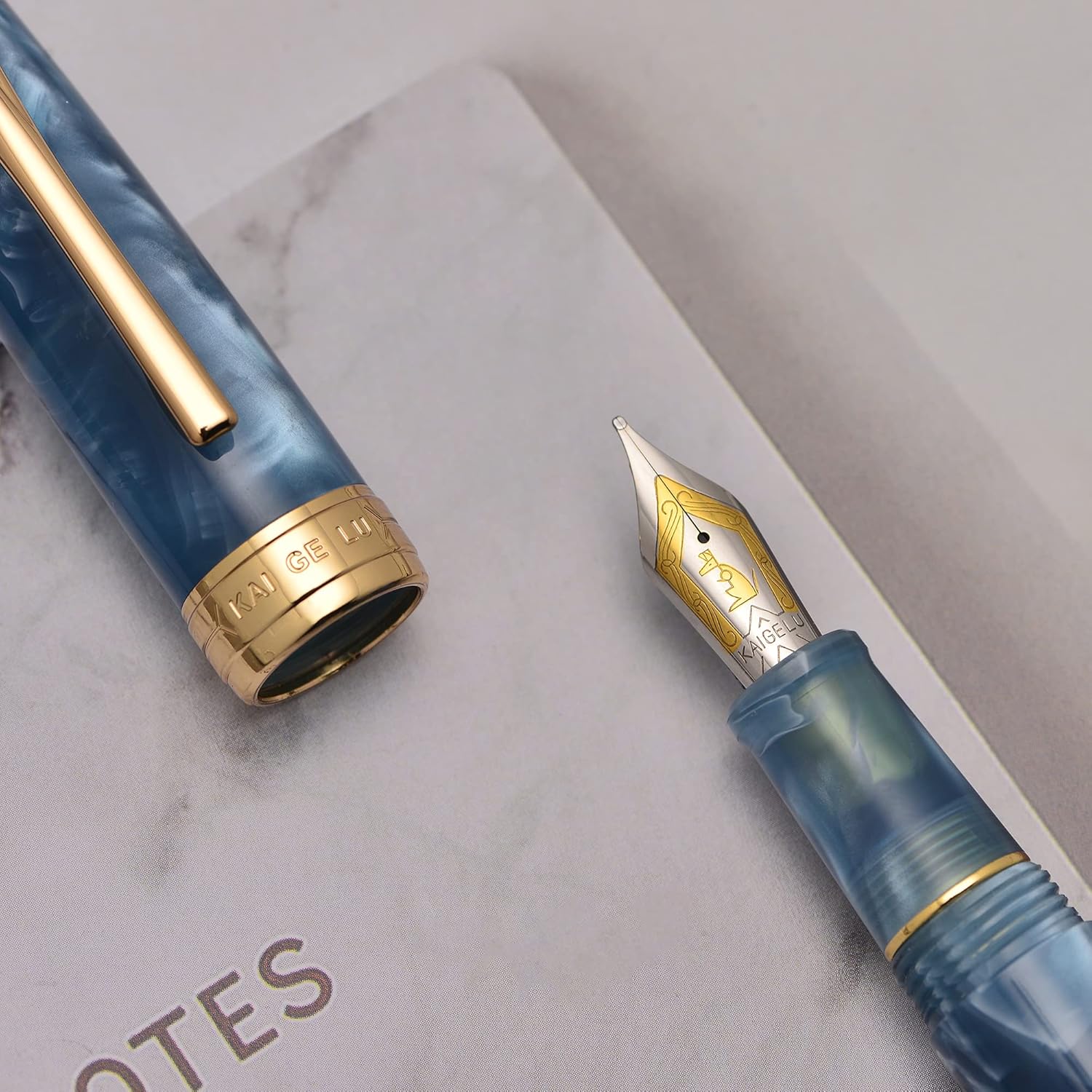 Kaigelu 356 Acrylic Fountain Pen with Iridium Nib, Blue White Marbled Resin Body, Gold Trim & Ink Converter