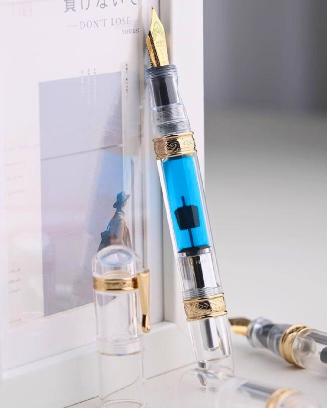 Moonman C5 Grand Slam Clear Fountain Pen – 99% Ink Fill Rate, High-Capacity Press-Type Piston, Transparent Acrylic Body, Gold-Plated Celtic Knot Decoration