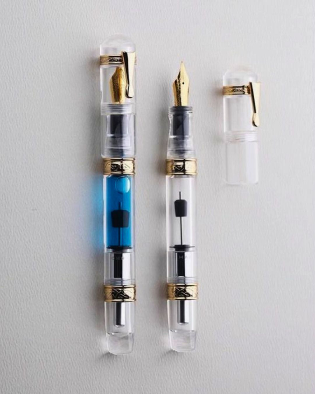 Moonman C5 Grand Slam Clear Fountain Pen – 99% Ink Fill Rate, High-Capacity Press-Type Piston, Transparent Acrylic Body, Gold-Plated Celtic Knot Decoration