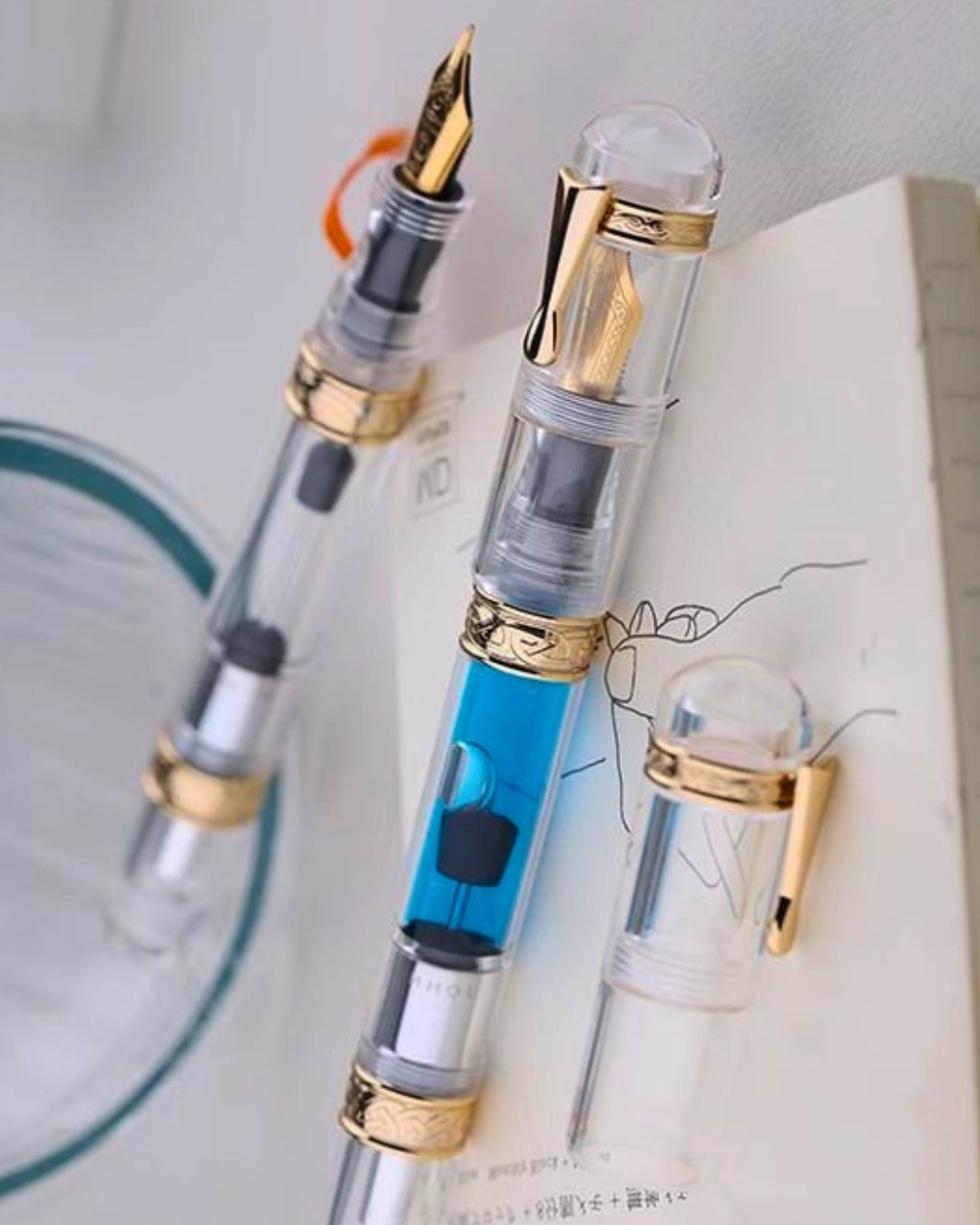 Moonman C5 Grand Slam Clear Fountain Pen – 99% Ink Fill Rate, High-Capacity Press-Type Piston, Transparent Acrylic Body, Gold-Plated Celtic Knot Decoration