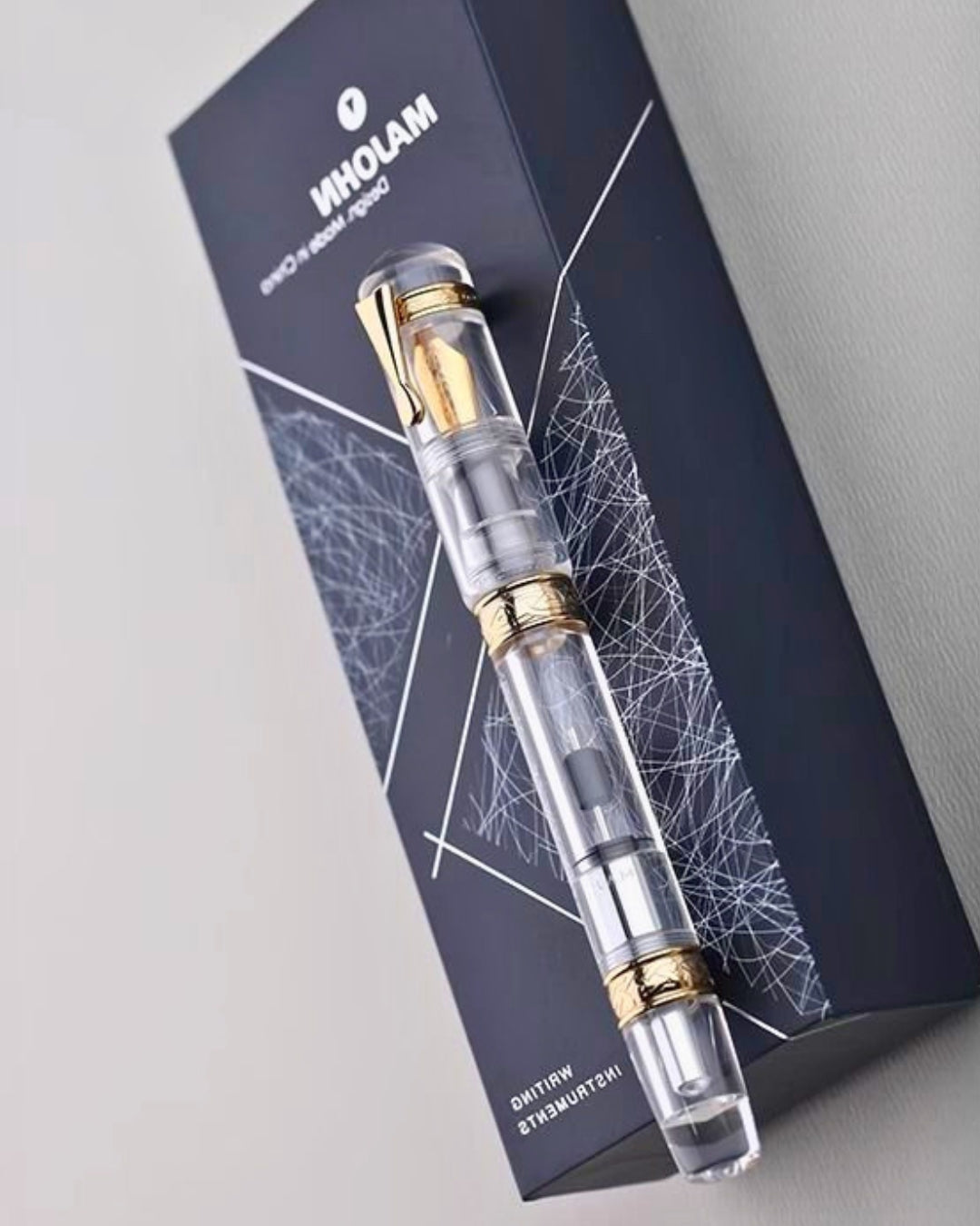 Moonman C5 Grand Slam Clear Fountain Pen – 99% Ink Fill Rate, High-Capacity Press-Type Piston, Transparent Acrylic Body, Gold-Plated Celtic Knot Decoration
