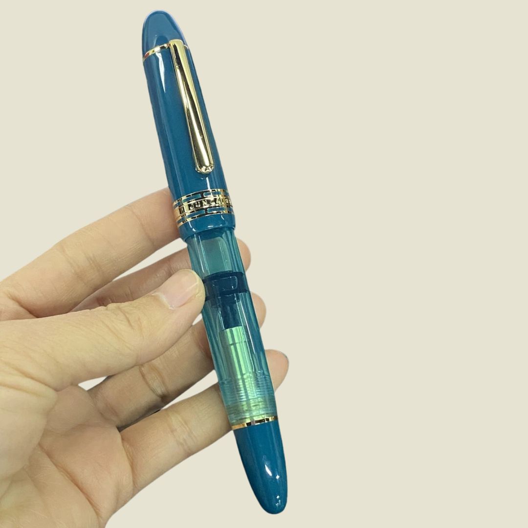 Wingsung 630 Piston Fountain Pen – Transparent Resin Barrel, #8 Fine Iridium Nib (Blue)