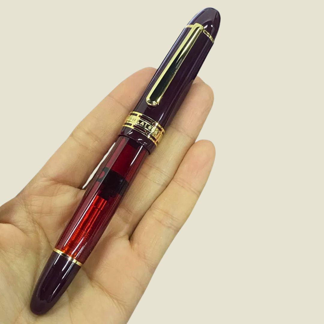 Wingsung 630 Piston Fountain Pen – Transparent Resin Barrel, #8 Fine Iridium Nib (Red)
