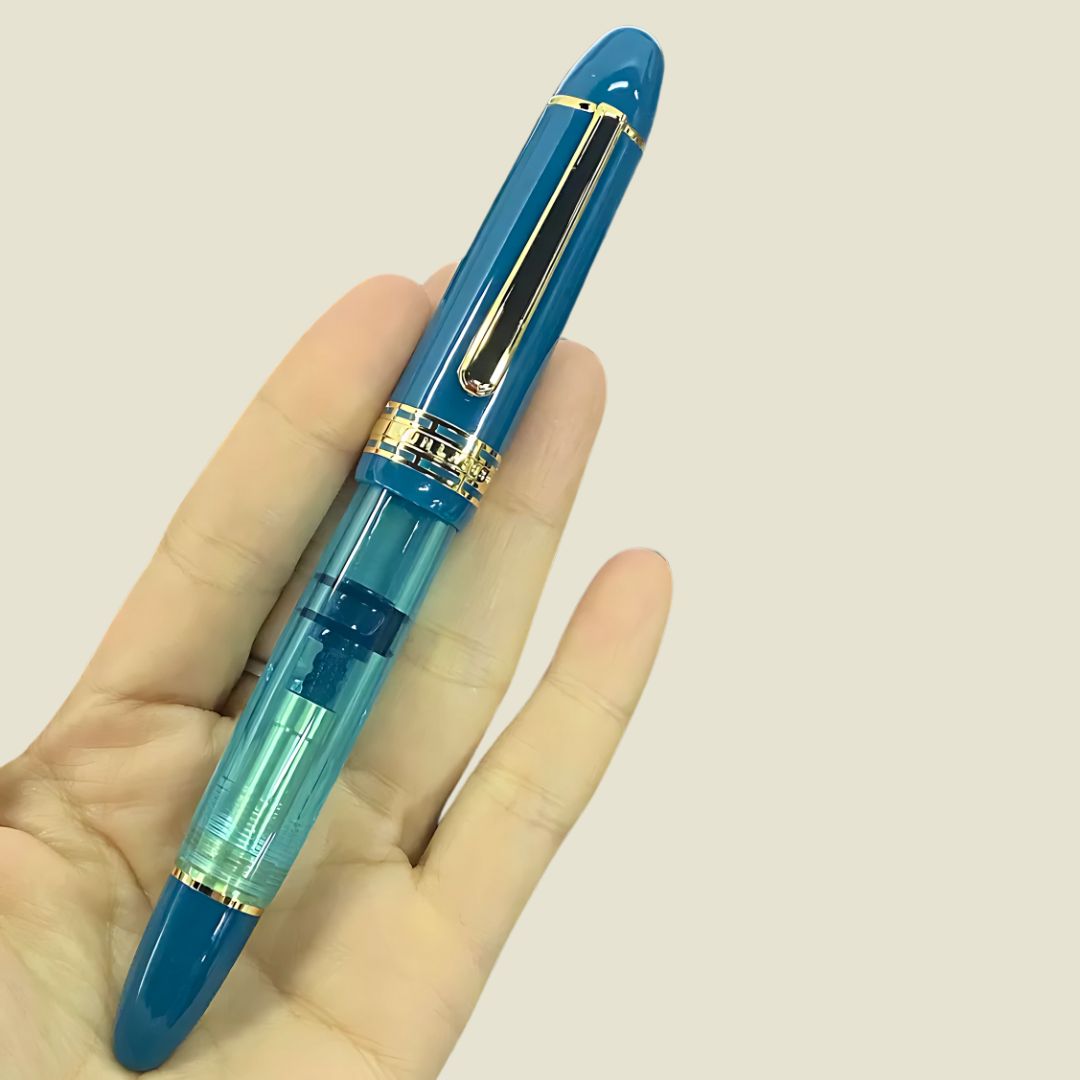 Wingsung 630 Piston Fountain Pen – Transparent Resin Barrel, #8 Fine Iridium Nib (Blue)