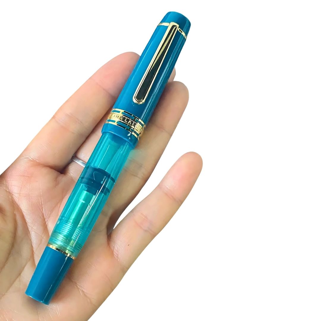 Wingsung 630 Piston Fountain Pen – Flat Top Transparent Barrel, #8 Iridium Fine Nib Resin Pen (Black, Sky Blue, Red)