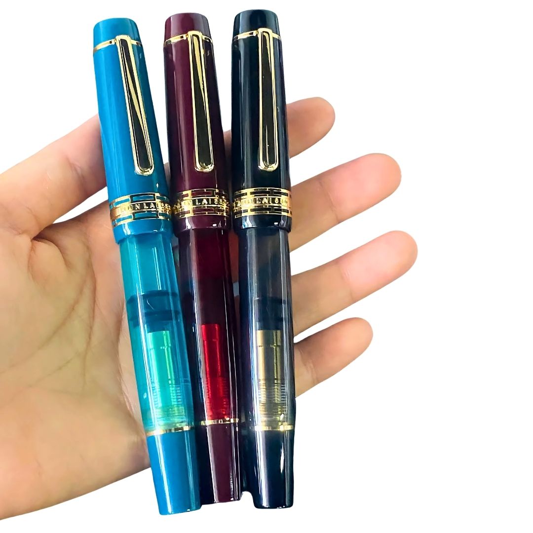 Wingsung 630 Piston Fountain Pen – Flat Top Transparent Barrel, #8 Iridium Fine Nib Resin Pen (Black, Sky Blue, Red)