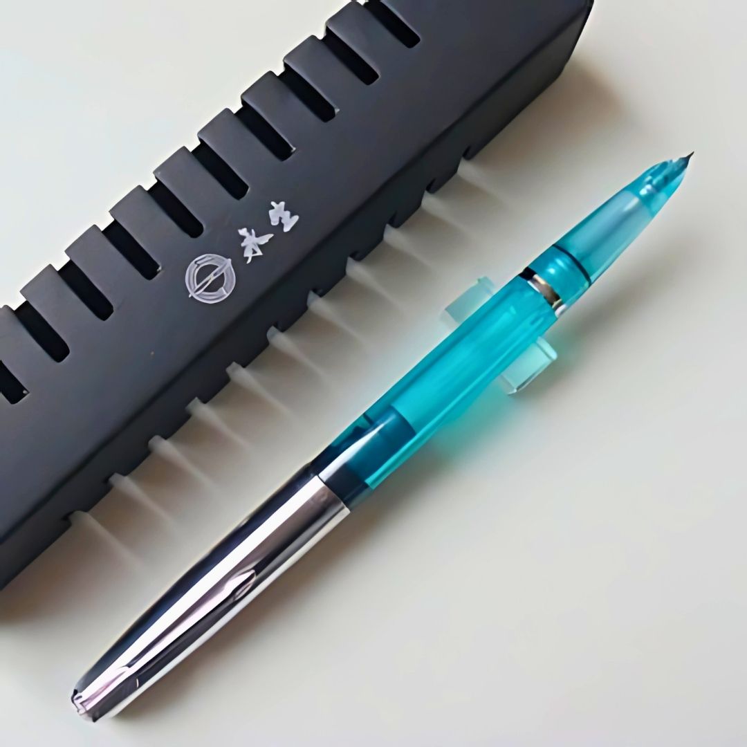 Wing Sung 601 Transparent Blue Vacumatic Fountain Pen – 0.5mm Fine Nib, Resin Body, Steel Cap, Push-Cap with Converter & Box (No Ink)