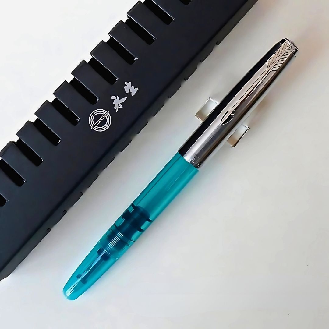 Wing Sung 601 Transparent Blue Vacumatic Fountain Pen – 0.5mm Fine Nib, Resin Body, Steel Cap, Push-Cap with Converter & Box (No Ink)