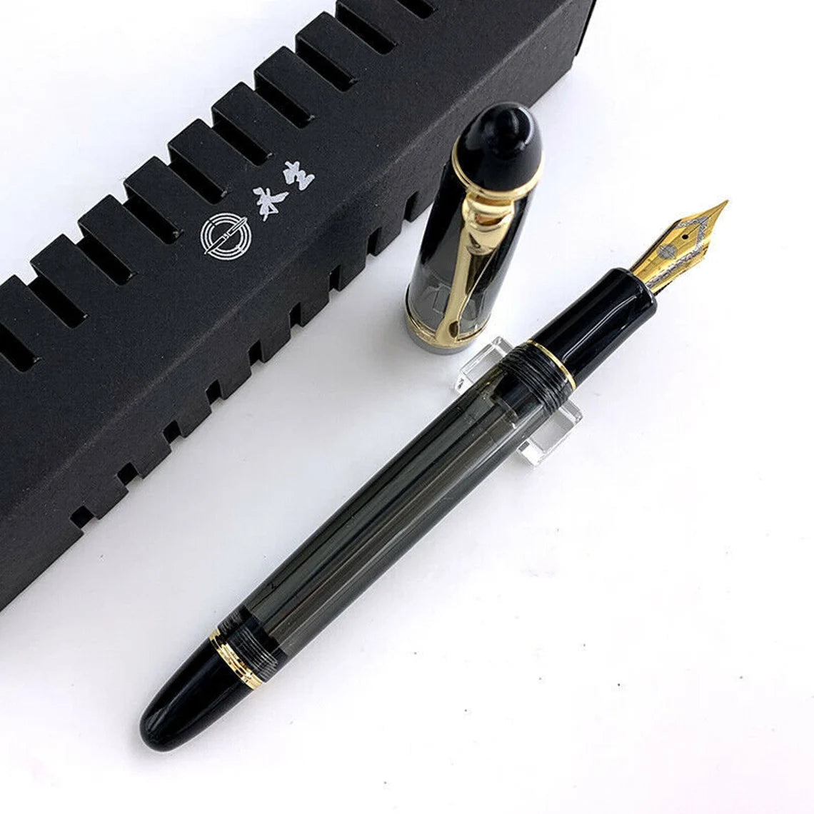 Wing Sung 699 Vacuum Filling Fountain Pen – Medium Steel Nib, Translucent Black Acrylic with Gold Clip