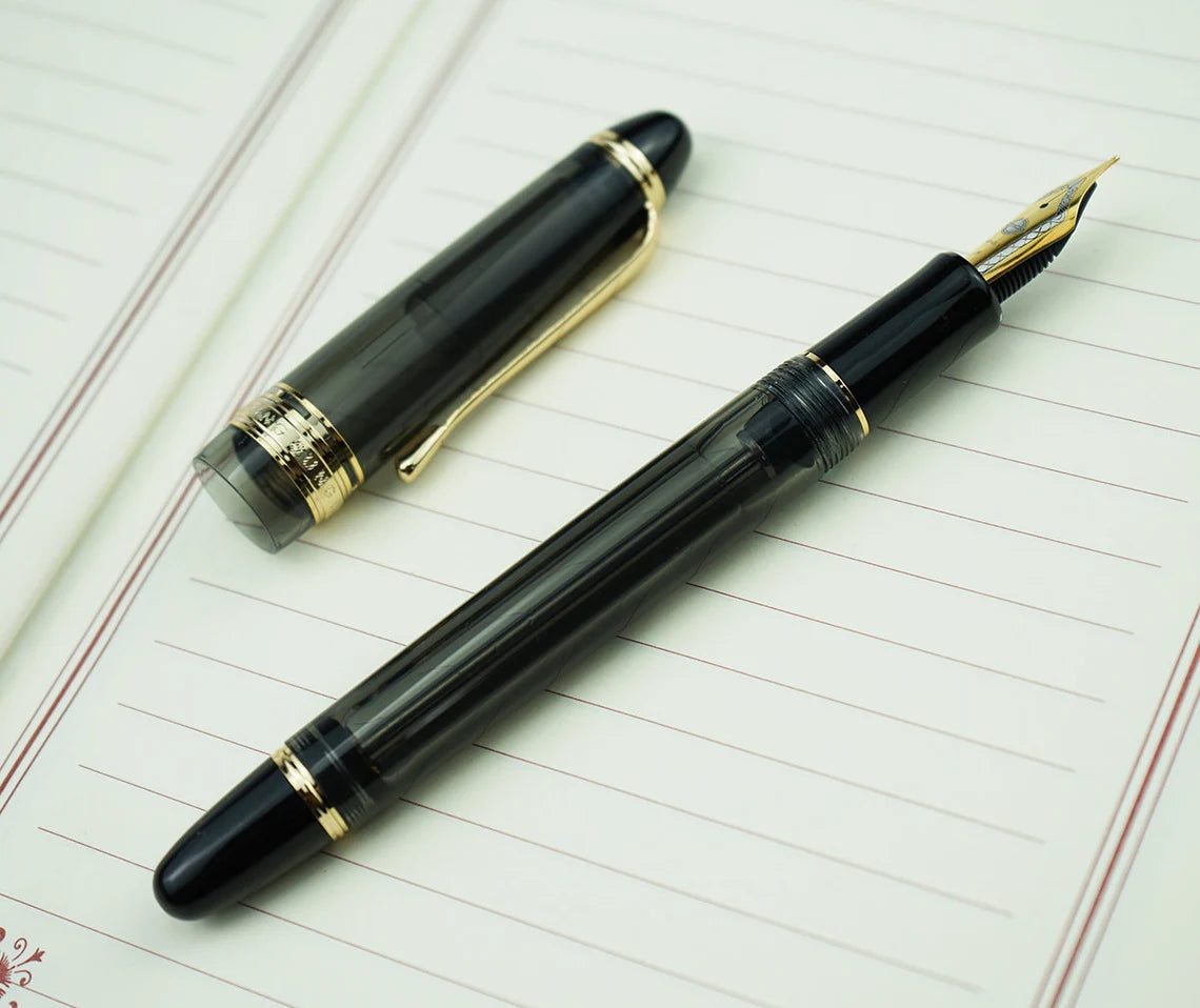 Wing Sung 699 Vacuum Filling Fountain Pen – Medium Steel Nib, Translucent Black Acrylic with Gold Clip