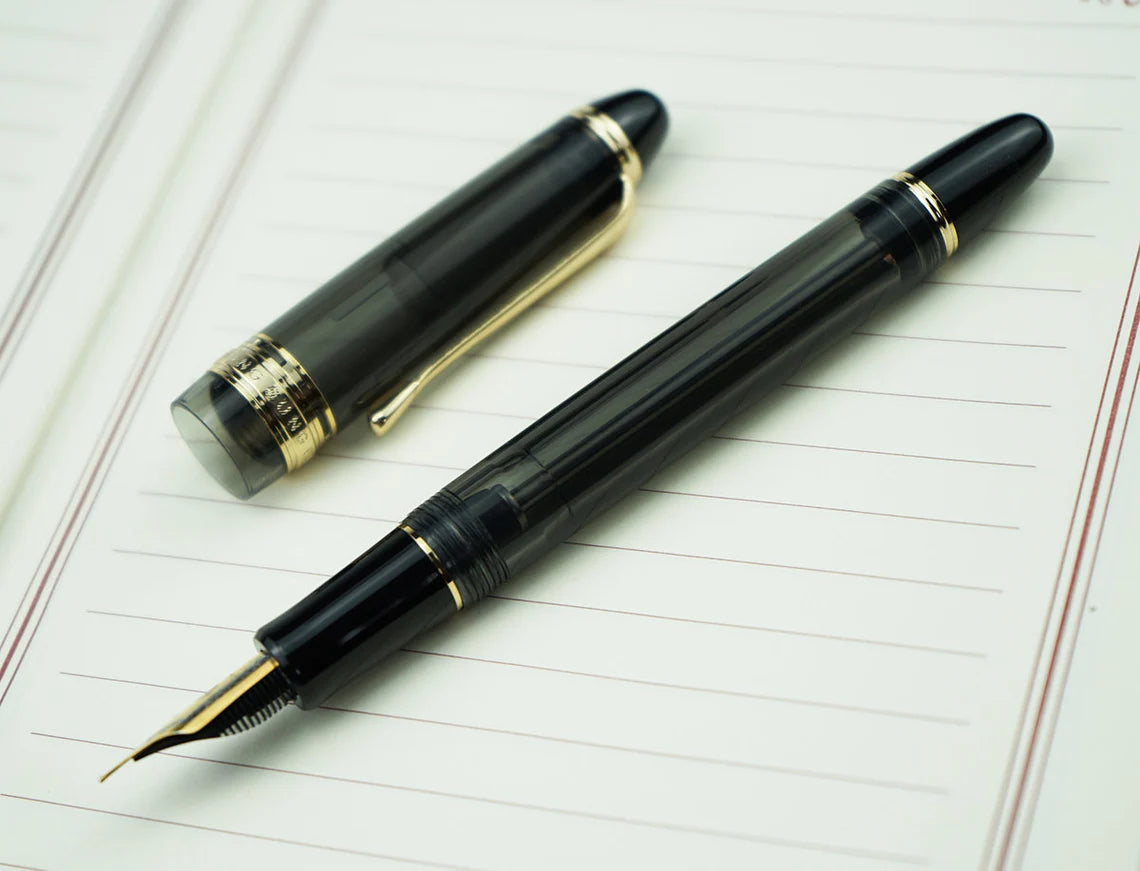 Wing Sung 699 Vacuum Filling Fountain Pen – Medium Steel Nib, Translucent Black Acrylic with Gold Clip