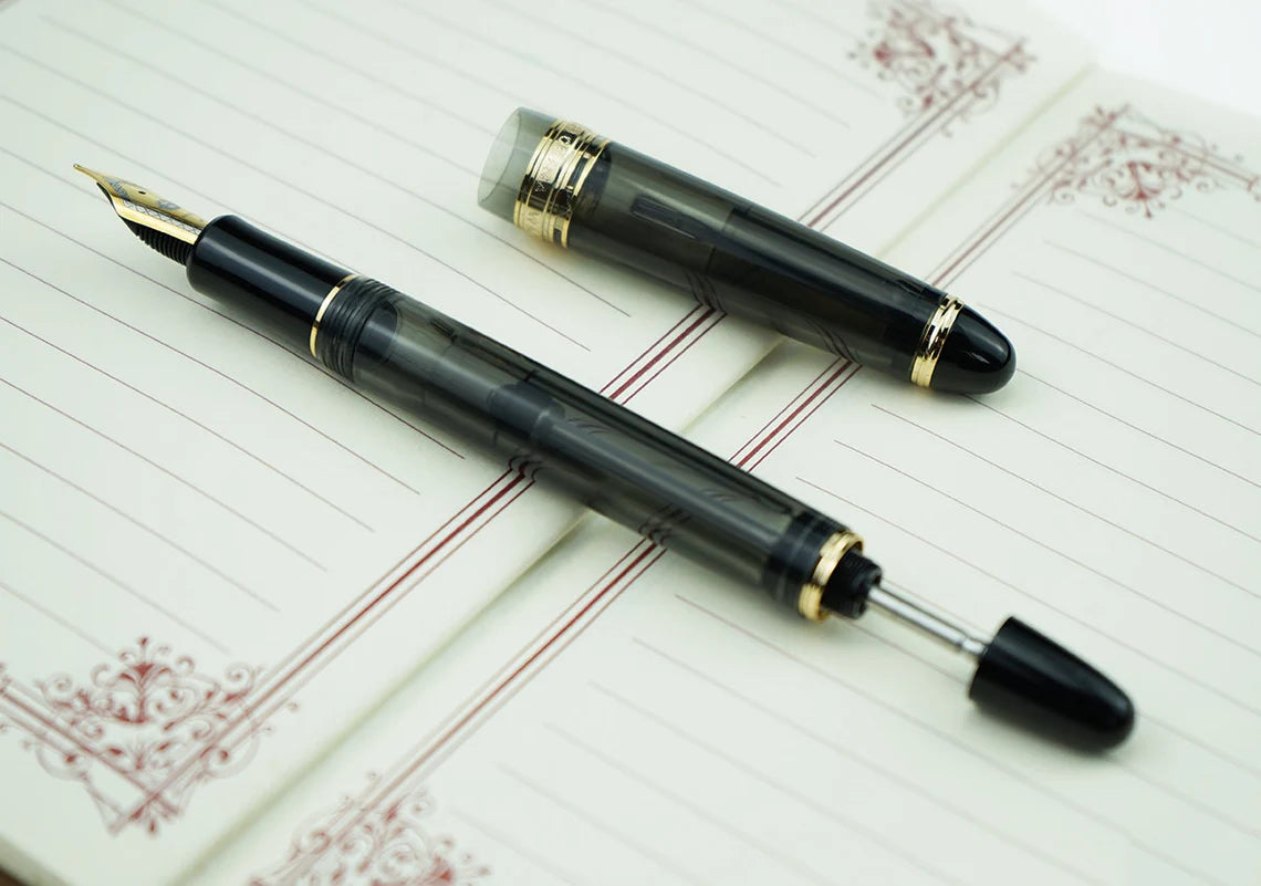 Wing Sung 699 Vacuum Filling Fountain Pen – Medium Steel Nib, Translucent Black Acrylic with Gold Clip