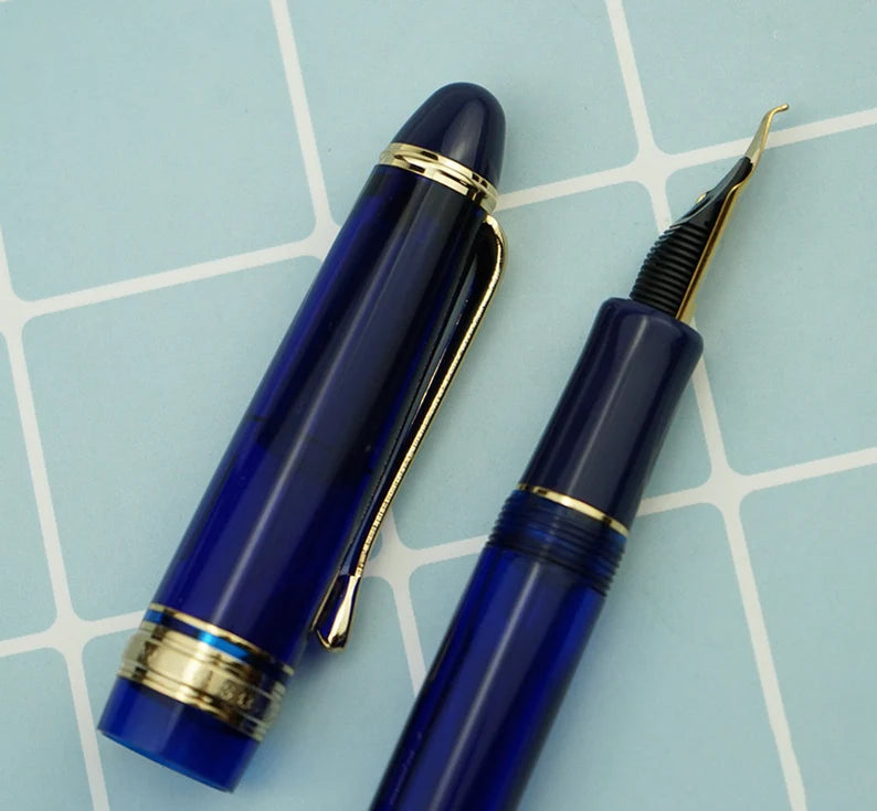 Wing Sung 699 Vacuum Filling Fountain Pen – Extra Fine Dual-Tone Nib, Translucent Blue Acrylic with Gold Clip